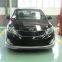 The KIA K2 is surrounded by 11-14 K2 front and rear spoiler skirts, and the KIA K2 bumper lower lip
