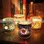 Handmade cup shaped glass mosaic candle holder