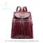 All purpose style bags leisure backpack, close by hook and tassel/fringe, nice burgundy color