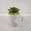 indoor ceramic plant pot with fake indoor artifical plants outdoor
