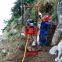 A small exploration drilling rig powered by gasoline that can perform rock sampling 50 meters underground