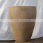 Fiberstone tapered vase with color sand spray on it