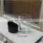 12 oz clear octagonal drinking glass with black sleeve