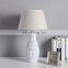 High quality cheap custom bedside lamp hotel home decor retro relief design white resin table lamps