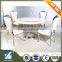 white modern round marble dining table