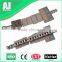 Sideflexing plate conveyor chain with base roller chains