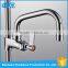 Modern kitchen design wall mounted spring loaded kitchen sink mixer tap brass faucet