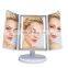 Hot selling black chargeable and portable led glass lighted makeup mirror trifold desktop magnifying makeup mirror