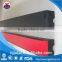 Impact resistant red UHMWPE with rubber buffer strip