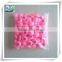 pink round water floating candle