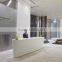white modern salon reception desk / fast food restaurant reception desk