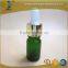 green essential oil glass bottle with silver glass pipette