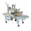 Automatic carton box sealing machine
