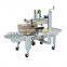 Automatic carton box sealing machine