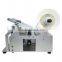 manual bottle labeler