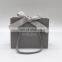 Boutique shop grey paper shoping gift bag with your own embossed silver logo