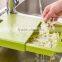 handing kitchen sink fruit vegetable plastic drainer basket