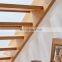Custom perforated steel screen balustrade staircase with black steel feature