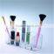 Acrylic brush holder with lid in cosmetic bags / cases