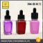 colorful pink red glass bottle manufacturer 30ml 30ml ejuice bottle with dropper with childproof evident cap empty glass bottles