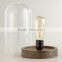 Decorative indoor cloche table light with Edison filament bulbs