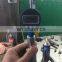 Removable travel measuring tools for 320D injectors