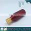 Red colored european glass essential oil bottle with gold cap