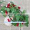 X'mas decorative red fruit flowers garland with green leaves