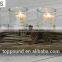 Decoratvie pinecone candle holder with white metal tree and glass cups