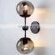 Creative personality double-headed magic bean glass wall lamp for decoration