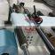 Automatic rewinding machine for non-woven fabric