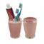 Plastic pink bath accessory toothbrush holder