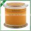 Multi colored scented candle in glass jar with glass lid