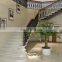 Low cost floating wooden step with light curved staircase
