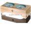 dog wooden dining-table with two ceramic bowls