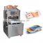 watsapp +86 15140601620 low cost continuous manual tray cooked food steamed meat sealer