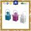 Colorful hanging small metal candle lantern with folower