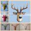 small wall-mounted resin animal heads