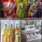 orange juice in plastic bag filling sealing machine