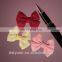 TINY PRE-TIED GROSGRAIN DOUBLE BOWS