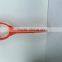 orange plastic shovel handle