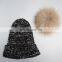 Adult size black striped pattern knitting hat with real raccoon fur bobble