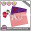 Pink paper bag with ribbon decoration