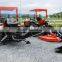 towable backhoe powered by agricultural tractor