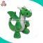 green cute stuffed dinosaur plush animal toy with spots