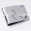 embossed metal and leather money clip wallet
