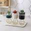 Ceramic vases, vials of Nordic ironwork, simple frame arrangement, gold-plated flowerpot