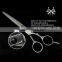 Hair dressing scissor made of Damascus steel