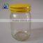 Honey glass packing jar with metal golden lid