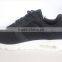 Air cushion outsole reasonable price black color famous sports shoes for men